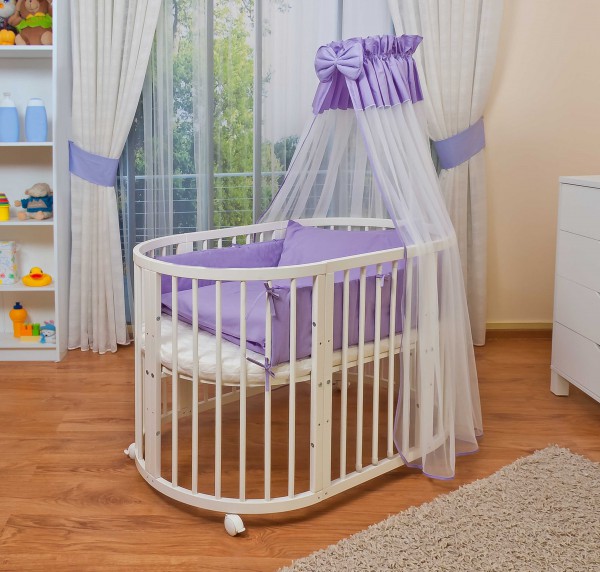 Овальная кровать для новорожденных
