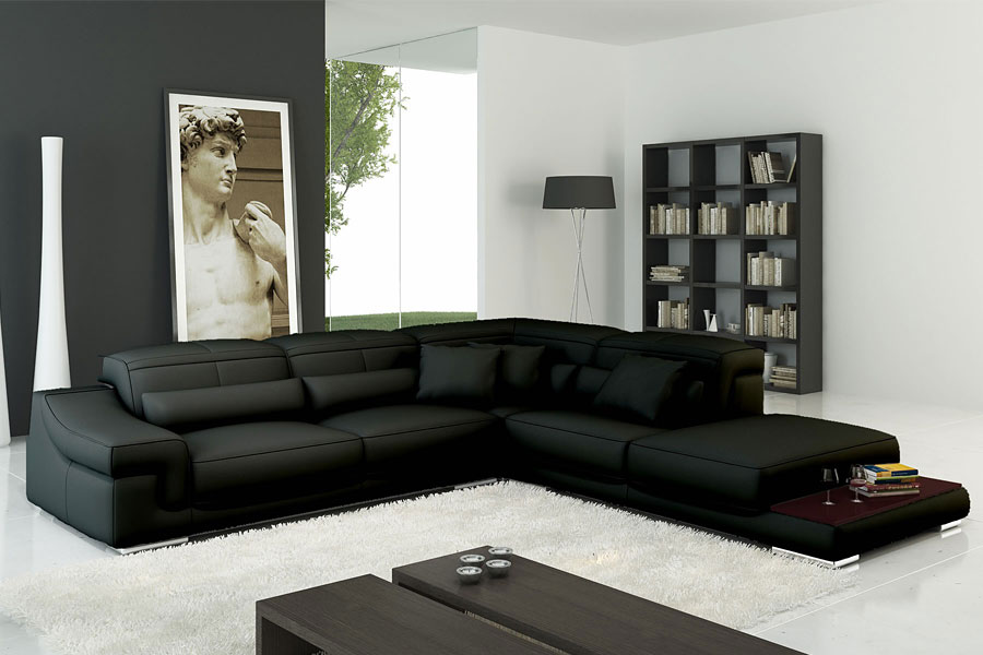 Фото интерьера с черными диваными