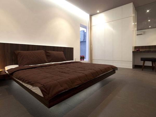 Кровать в стиле лофт, выполенная в коричневом цвете