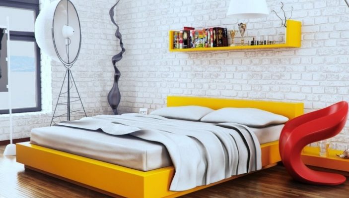 Желтая кровать в интерьере в стиле лофт