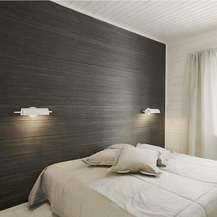 Ламинат на стене в спальне над кроватью
